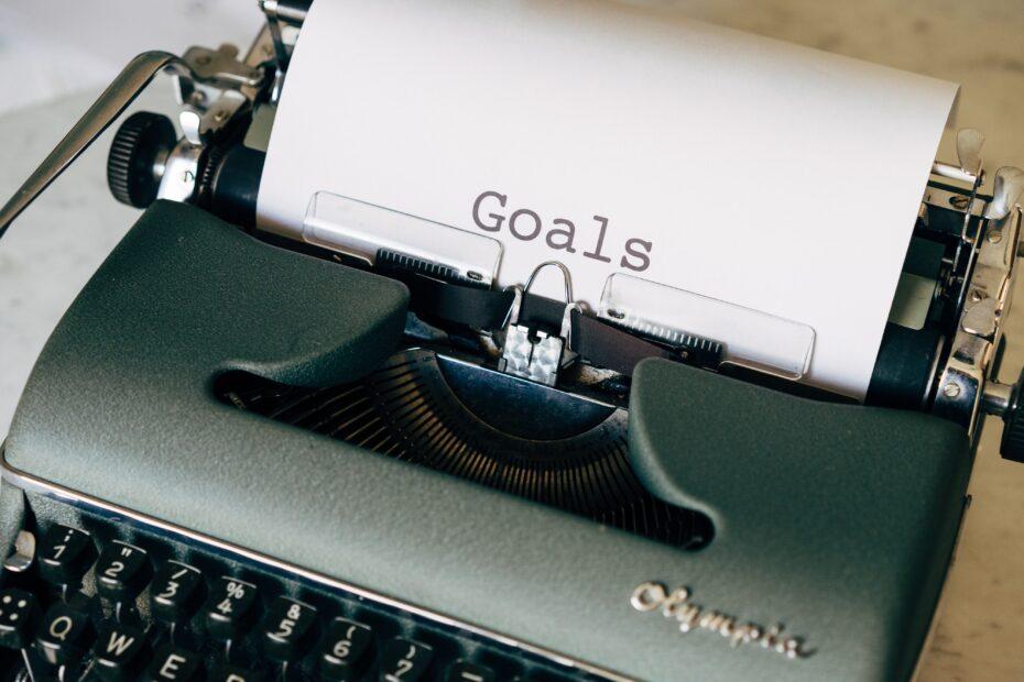 Typewriter with Goals on paper