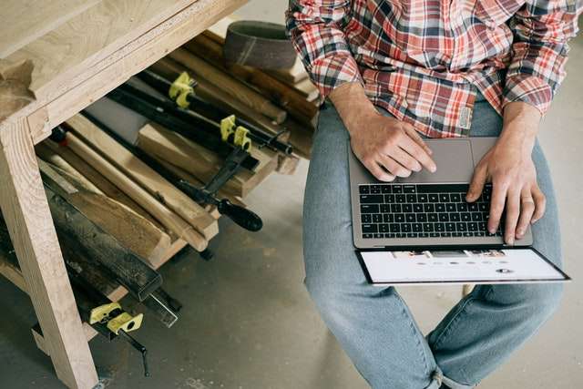 Construction worker on his laptop