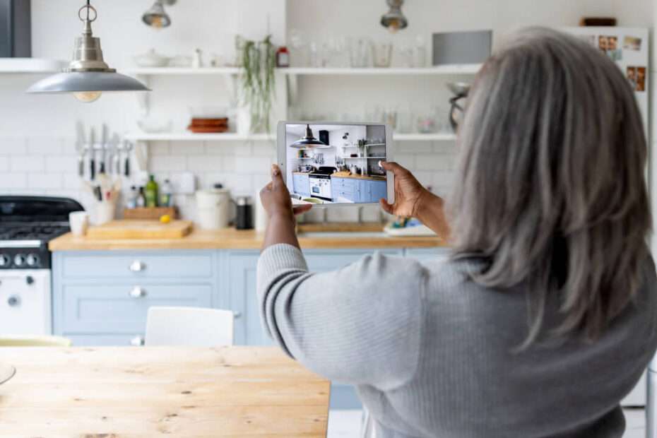 Build a library of user generated content from your Customer - woman taking photo of a room